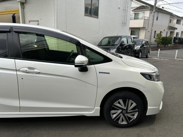 シャトル ハイブリッド ◆【禁煙・社外7型メモリーナビ】 133,739KM/R7年製タイヤ/フルセグ/CD/DVD/ラジオ/HIDライト/スチールホイール/ETC/スマートキー/ヘッドライトレベライザー/横滑り防止/オートエアコン保証書/取扱説明書(15枚目)