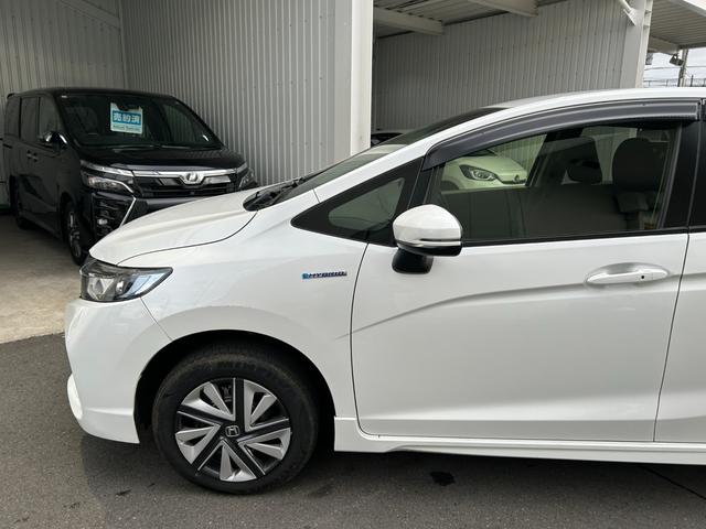 シャトル ハイブリッド ◆【禁煙・社外7型メモリーナビ】 133,739KM/R7年製タイヤ/フルセグ/CD/DVD/ラジオ/HIDライト/スチールホイール/ETC/スマートキー/ヘッドライトレベライザー/横滑り防止/オートエアコン保証書/取扱説明書(17枚目)