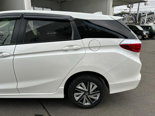 シャトル ハイブリッド ◆【禁煙・社外7型メモリーナビ】 133,739KM/R7年製タイヤ/フルセグ/CD/DVD/ラジオ/HIDライト/スチールホイール/ETC/スマートキー/ヘッドライトレベライザー/横滑り防止/オートエアコン保証書/取扱説明書(18枚目)