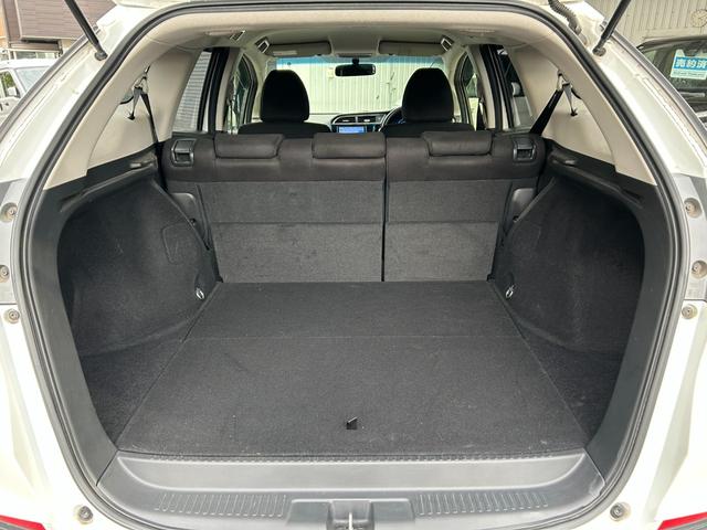 シャトル ハイブリッド ◆【禁煙・社外7型メモリーナビ】 133,739KM/R7年製タイヤ/フルセグ/CD/DVD/ラジオ/HIDライト/スチールホイール/ETC/スマートキー/ヘッドライトレベライザー/横滑り防止/オートエアコン保証書/取扱説明書(24枚目)