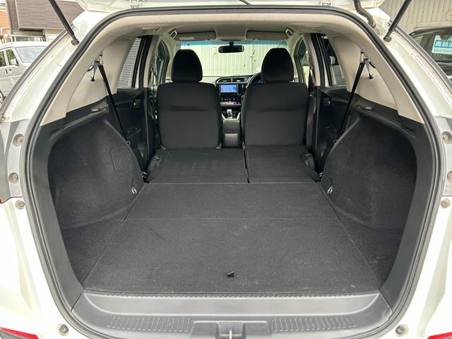 シャトル ハイブリッド ◆【禁煙・社外7型メモリーナビ】 133,739KM/R7年製タイヤ/フルセグ/CD/DVD/ラジオ/HIDライト/スチールホイール/ETC/スマートキー/ヘッドライトレベライザー/横滑り防止/オートエアコン保証書/取扱説明書(25枚目)