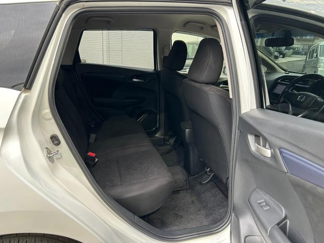 シャトル ハイブリッド ◆【禁煙・社外7型メモリーナビ】 133,739KM/R7年製タイヤ/フルセグ/CD/DVD/ラジオ/HIDライト/スチールホイール/ETC/スマートキー/ヘッドライトレベライザー/横滑り防止/オートエアコン保証書/取扱説明書(28枚目)