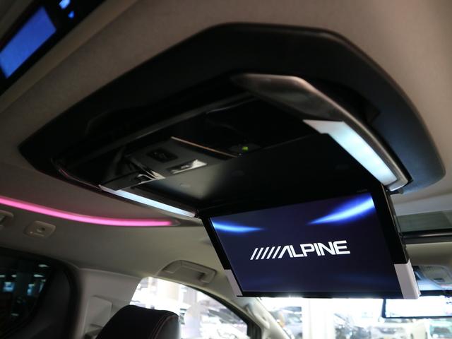 Zトヨタセーフティセンス4WD・禁煙・ALPINE11型ナビ ・12.8型後席モニター・後期・サンルーフ・両電動スライド・追従クルコン・オートハイビーム・オットマン・ETC・デジタルミラー型前後ドラレコ・フィルム・TV・DVD・BT・純正17AW・カーアロマ(25枚目)