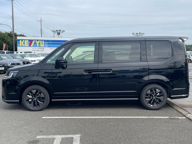 ステップワゴン e:HEVスパーダ/登録済み未使用車/マルチビューカメラ/ 11型ホンダコネクトナビ/14型後席モニター/フルセグ/Bluetooth/ホンダセンシング/両側PSD/電動リアゲート/BSM/レーダークルコン/シートヒーター/LEDヘッドライト/オットマン(11枚目)