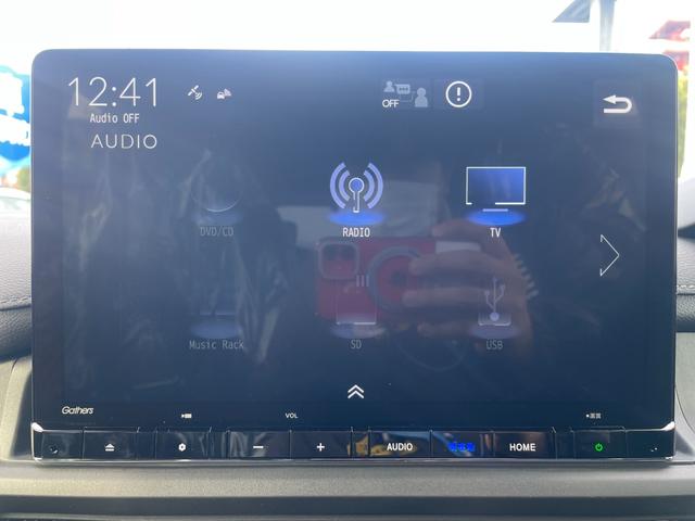 ステップワゴン e:HEVスパーダ/登録済み未使用車/マルチビューカメラ/ 11型ホンダコネクトナビ/14型後席モニター/フルセグ/Bluetooth/ホンダセンシング/両側PSD/電動リアゲート/BSM/レーダークルコン/シートヒーター/LEDヘッドライト/オットマン(24枚目)