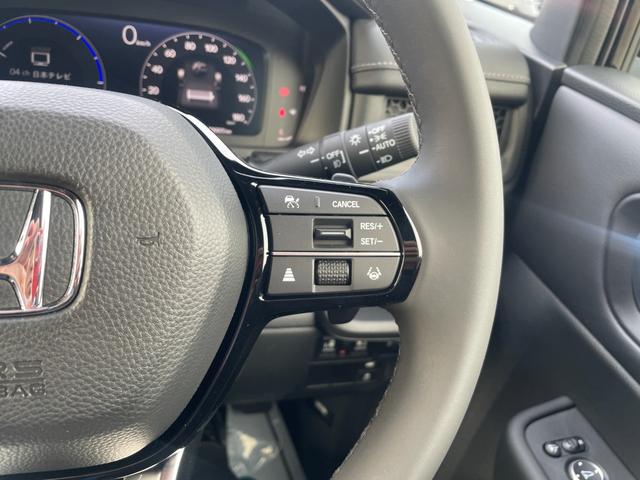 ステップワゴン e:HEVスパーダ/登録済み未使用車/マルチビューカメラ/ 11型ホンダコネクトナビ/14型後席モニター/フルセグ/Bluetooth/ホンダセンシング/両側PSD/電動リアゲート/BSM/レーダークルコン/シートヒーター/LEDヘッドライト/オットマン(31枚目)