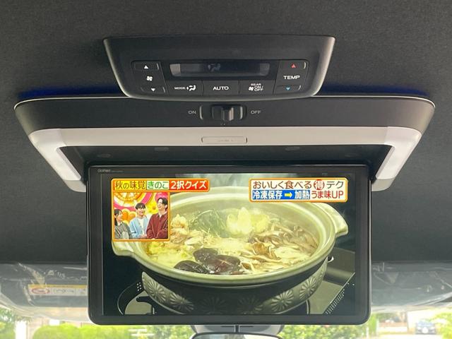 ステップワゴン e:HEVスパーダ/登録済み未使用車/マルチビューカメラ/ 11型ホンダコネクトナビ/14型後席モニター/フルセグ/Bluetooth/ホンダセンシング/両側PSD/電動リアゲート/BSM/レーダークルコン/シートヒーター/LEDヘッドライト/オットマン(35枚目)