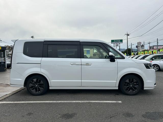 ステップワゴン スパーダ/ターボ/八王子直仕入/禁煙車/走行26003KM/ ホンダセンシング/純正8インチナビ/フルセグ/Bluetooth/バックカメラ/ETC/レーダークルコン/両側PSD/電動リアゲート/ハーフレザーシート/シートヒーター/LEDヘッドライト/フォグ(8枚目)