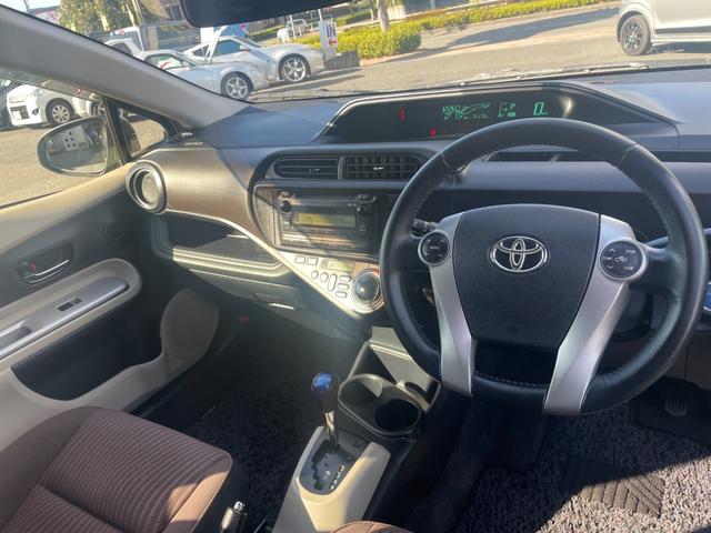アクア Ｇ／八王子直仕入／走行７５１７３ｋｍ／ブレーキアシスト機能／　禁煙車／雹害車／ＥＢＤ機能付ＡＢＳ搭載／横滑り防止／ＣＤオーディオ／オートライト／盗難防止装置／プッシュスタート／革巻きステアリング／フロアマット／サイドバイザー／ヘッドライトレベライザー／スペアキー（19枚目）