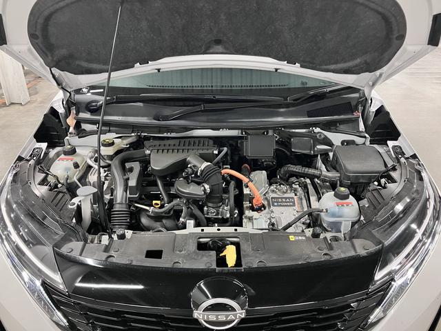 オーラ ニスモ　寒冷地仕様／シート＆ステアリングヒーター　ＮＣ９インチナビ　プロパイロット　アラウンドビュー　ＢＳＷ　ワイヤレス充電　ＥＴＣ２．０　ＢＴオーディオ　フルセグＴＶ　ＨＤＭＩ　専用ハーフレザーシート　クリアランスソナー　ＬＥＤライト　専用１７ＡＷ（21枚目）