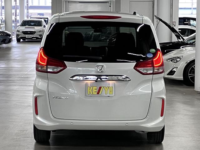 フリード G・ホンダセンシング ワンオーナー 後席モニター 純正9インチナビ 両側電動スライド 衝突軽減ブレーキ アダプティブクルーズ レーンキープ ETC バックカメラ BTオーディオ フルセグ CD・DVD USB LEDライト スマートキー(7枚目)