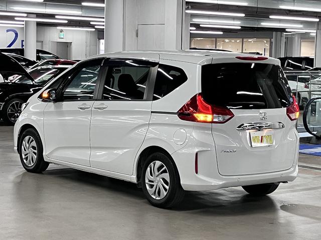 フリード G・ホンダセンシング ワンオーナー 後席モニター 純正9インチナビ 両側電動スライド 衝突軽減ブレーキ アダプティブクルーズ レーンキープ ETC バックカメラ BTオーディオ フルセグ CD・DVD USB LEDライト スマートキー(8枚目)
