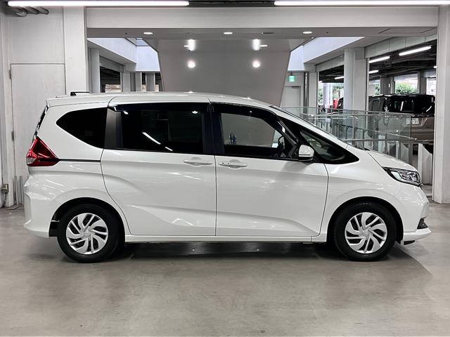 フリード G・ホンダセンシング ワンオーナー 後席モニター 純正9インチナビ 両側電動スライド 衝突軽減ブレーキ アダプティブクルーズ レーンキープ ETC バックカメラ BTオーディオ フルセグ CD・DVD USB LEDライト スマートキー(9枚目)