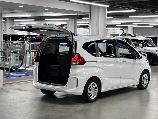 フリード G・ホンダセンシング ワンオーナー 後席モニター 純正9インチナビ 両側電動スライド 衝突軽減ブレーキ アダプティブクルーズ レーンキープ ETC バックカメラ BTオーディオ フルセグ CD・DVD USB LEDライト スマートキー(27枚目)