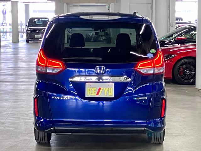 フリード+ハイブリッド ハイブリッドEX 寒冷地仕様 衝突軽減ブレーキ 車線逸脱警報 アダプティブクルーズ ETC シートヒーター 両側パワースライド 純正ナビ バックカメラ BTオーディオ フルセグ スマートキー LEDランプ 純正15AW(7枚目)