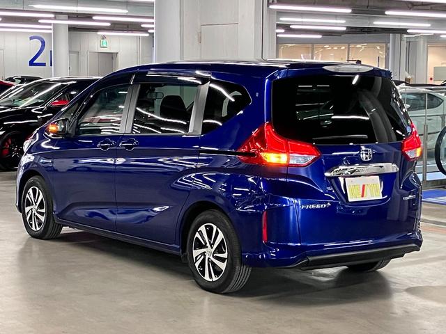 フリード+ハイブリッド ハイブリッドEX 寒冷地仕様 衝突軽減ブレーキ 車線逸脱警報 アダプティブクルーズ ETC シートヒーター 両側パワースライド 純正ナビ バックカメラ BTオーディオ フルセグ スマートキー LEDランプ 純正15AW(8枚目)