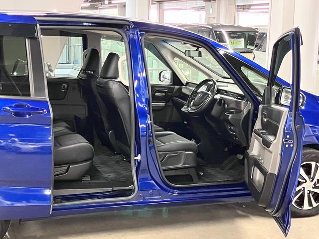 フリード+ハイブリッド ハイブリッドEX 寒冷地仕様 衝突軽減ブレーキ 車線逸脱警報 アダプティブクルーズ ETC シートヒーター 両側パワースライド 純正ナビ バックカメラ BTオーディオ フルセグ スマートキー LEDランプ 純正15AW(12枚目)