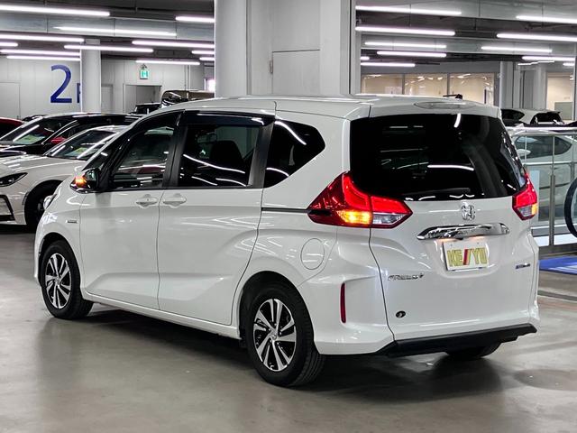 フリード+ハイブリッド ハイブリッドEX 寒冷地仕様 衝突軽減ブレーキ 車線逸脱警報 アダプティブクルーズ ETC 両側パワースライド シートヒーター 純正ナビ バックカメラ BTオーディオ フルセグTV USB端子 スマートキー LEDランプ 15AW(8枚目)