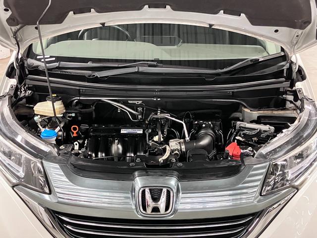 フリード+ハイブリッド ハイブリッドEX 寒冷地仕様 衝突軽減ブレーキ 車線逸脱警報 アダプティブクルーズ ETC 両側パワースライド シートヒーター 純正ナビ バックカメラ BTオーディオ フルセグTV USB端子 スマートキー LEDランプ 15AW(21枚目)