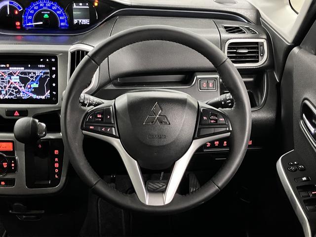 デリカD:2 ハイブリッドSZ ナビパッケージ 純正フルエアロ 衝突軽減ブレーキ 車線逸脱警報 全方位モニター付メモリーナビ シートヒーター 両側電動スライド BTオーディオ フルセグTV ETC クルコン 後席テーブル&サンシェード スマートキー HIDライト(11枚目)