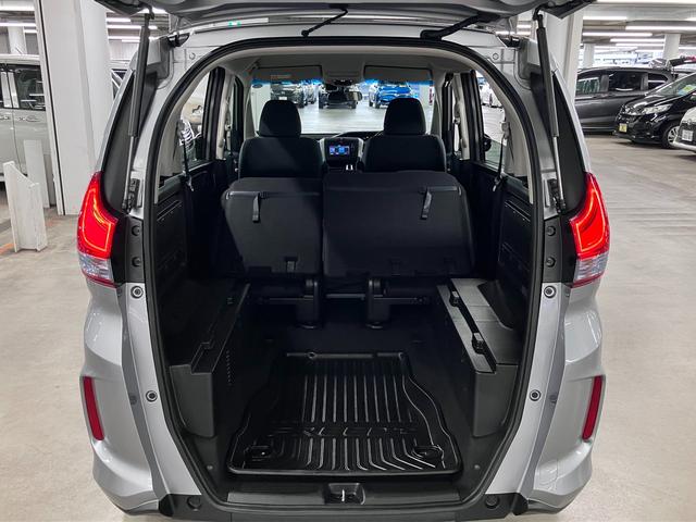 フリード+ハイブリッド ハイブリッドG・ホンダセンシング ワンオーナー 衝突軽減ブレーキ 車線逸脱警報 アダプティブクルーズ ETC 両側パワースライド 純正ディスプレイオーディオ バックカメラ CD再生 TV USB端子 オートエアコン 電動格納ドアミラー LEDランプ(16枚目)