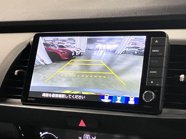 フィット ｅ：ＨＥＶベーシック　ホンダセンシング　ワンオーナー　純正９インチナビ　バックカメラ　ＢＴオーディオ　フルセグＴＶ　ＣＤ・ＤＶＤ　ＥＴＣ　誤発進抑制機能　アダプティブクルーズ　パーキングセンサー　ブレーキホールド　ＬＥＤライト　スマートキー　スペアキー有（29枚目）