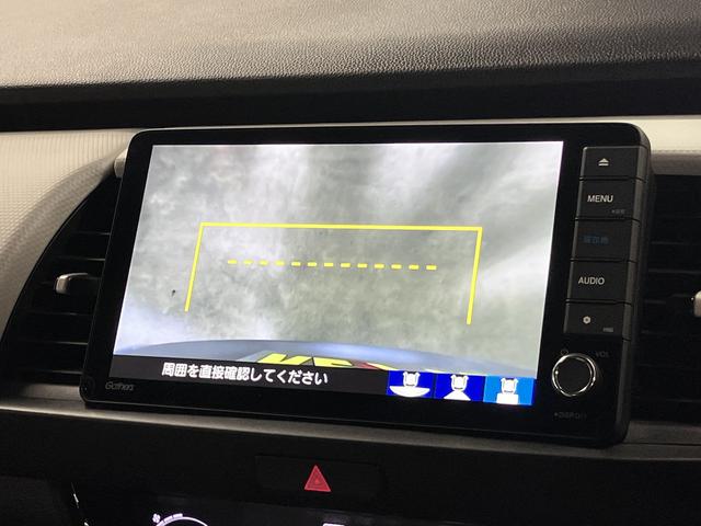 フィット ｅ：ＨＥＶベーシック　ホンダセンシング　ワンオーナー　純正９インチナビ　バックカメラ　ＢＴオーディオ　フルセグＴＶ　ＣＤ・ＤＶＤ　ＥＴＣ　誤発進抑制機能　アダプティブクルーズ　パーキングセンサー　ブレーキホールド　ＬＥＤライト　スマートキー　スペアキー有（30枚目）