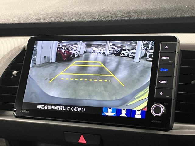フィット ｅ：ＨＥＶベーシック　ホンダセンシング　ワンオーナー　純正９インチナビ　バックカメラ　ＢＴオーディオ　フルセグＴＶ　ＣＤ・ＤＶＤ　ＥＴＣ　誤発進抑制機能　アダプティブクルーズ　パーキングセンサー　オートブレーキホールド　ＬＥＤライト　スマートキー　記録簿（29枚目）
