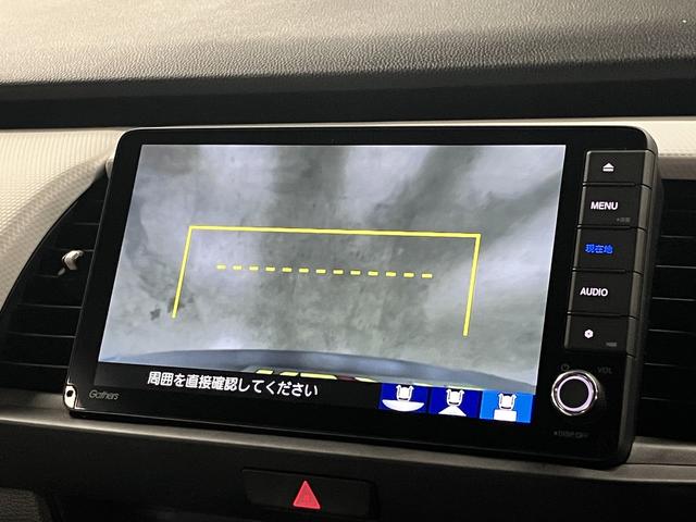 フィット ｅ：ＨＥＶベーシック　ホンダセンシング　ワンオーナー　純正９インチナビ　バックカメラ　ＢＴオーディオ　フルセグＴＶ　ＣＤ・ＤＶＤ　ＥＴＣ　誤発進抑制機能　アダプティブクルーズ　パーキングセンサー　オートブレーキホールド　ＬＥＤライト　スマートキー　記録簿（30枚目）