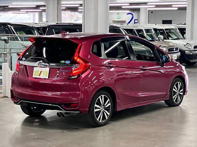 フィットハイブリッド S ホンダセンシング 寒冷地仕様 無限マフラー 衝突軽減ブレーキ 車線逸脱警報 アダプティブクルーズ パドルシフト ETC 純正ナビ バックカメラ BTオーディオ フルセグ スマートキー オートリトラミラー LEDランプ(3枚目)