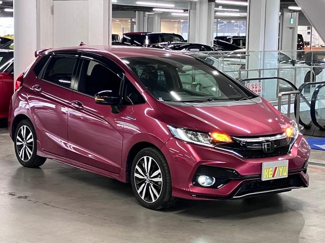 フィットハイブリッド S ホンダセンシング 寒冷地仕様 無限マフラー 衝突軽減ブレーキ 車線逸脱警報 アダプティブクルーズ パドルシフト ETC 純正ナビ バックカメラ BTオーディオ フルセグ スマートキー オートリトラミラー LEDランプ(5枚目)