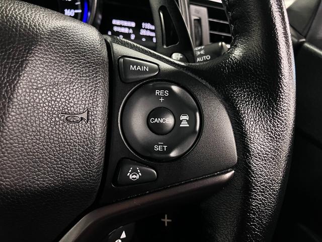 フィットハイブリッド S ホンダセンシング 寒冷地仕様 無限マフラー 衝突軽減ブレーキ 車線逸脱警報 アダプティブクルーズ パドルシフト ETC 純正ナビ バックカメラ BTオーディオ フルセグ スマートキー オートリトラミラー LEDランプ(20枚目)