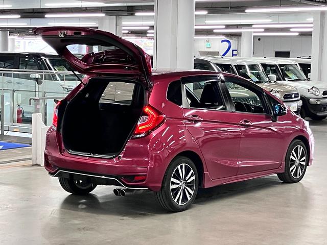 フィットハイブリッド S ホンダセンシング 寒冷地仕様 無限マフラー 衝突軽減ブレーキ 車線逸脱警報 アダプティブクルーズ パドルシフト ETC 純正ナビ バックカメラ BTオーディオ フルセグ スマートキー オートリトラミラー LEDランプ(25枚目)