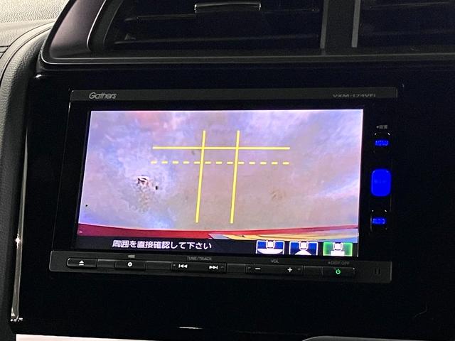 フィットハイブリッド S ホンダセンシング 寒冷地仕様 無限マフラー 衝突軽減ブレーキ 車線逸脱警報 アダプティブクルーズ パドルシフト ETC 純正ナビ バックカメラ BTオーディオ フルセグ スマートキー オートリトラミラー LEDランプ(28枚目)