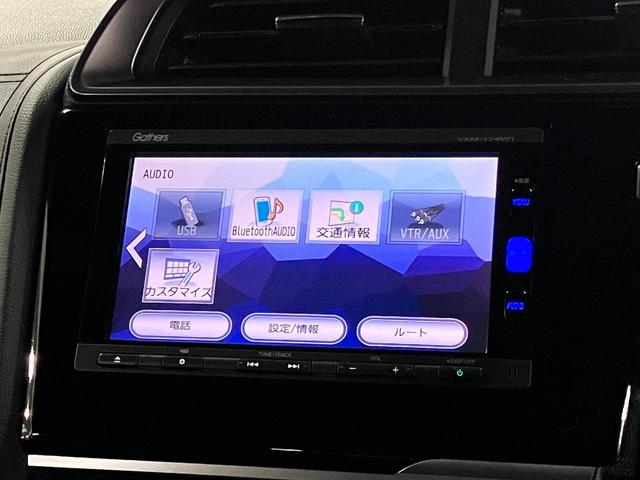 フィットハイブリッド S ホンダセンシング 寒冷地仕様 無限マフラー 衝突軽減ブレーキ 車線逸脱警報 アダプティブクルーズ パドルシフト ETC 純正ナビ バックカメラ BTオーディオ フルセグ スマートキー オートリトラミラー LEDランプ(30枚目)