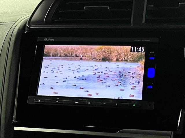 フィットハイブリッド S ホンダセンシング 寒冷地仕様 無限マフラー 衝突軽減ブレーキ 車線逸脱警報 アダプティブクルーズ パドルシフト ETC 純正ナビ バックカメラ BTオーディオ フルセグ スマートキー オートリトラミラー LEDランプ(31枚目)