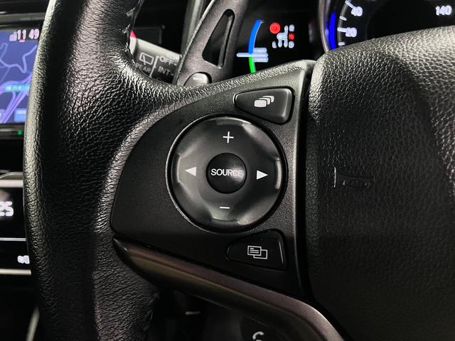 フィットハイブリッド S ホンダセンシング 寒冷地仕様 無限マフラー 衝突軽減ブレーキ 車線逸脱警報 アダプティブクルーズ パドルシフト ETC 純正ナビ バックカメラ BTオーディオ フルセグ スマートキー オートリトラミラー LEDランプ(36枚目)