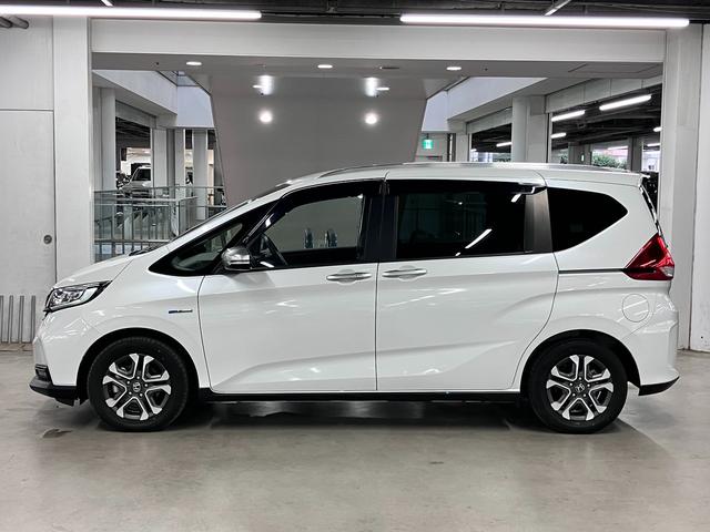 フリードハイブリッド ハイブリッド・クロスターホンダセンシング 衝突軽減ブレーキ 車線逸脱警報 アダプティブクルーズ ETC 純正9インチナビ 両側パワースライド バックカメラ BTオーディオ フルセグTV USB スマートキー オートリトラミラー LEDランプ(10枚目)