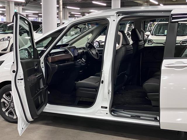 フリードハイブリッド ハイブリッド・クロスターホンダセンシング 衝突軽減ブレーキ 車線逸脱警報 アダプティブクルーズ ETC 純正9インチナビ 両側パワースライド バックカメラ BTオーディオ フルセグTV USB スマートキー オートリトラミラー LEDランプ(22枚目)