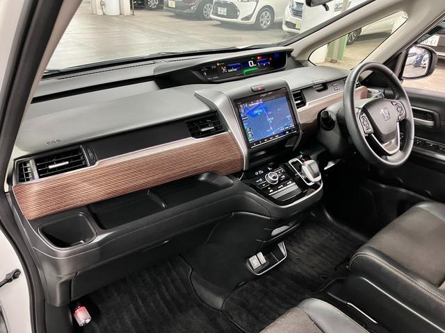 フリードハイブリッド ハイブリッド・クロスターホンダセンシング 衝突軽減ブレーキ 車線逸脱警報 アダプティブクルーズ ETC 純正9インチナビ 両側パワースライド バックカメラ BTオーディオ フルセグTV USB スマートキー オートリトラミラー LEDランプ(23枚目)