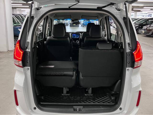 フリードハイブリッド ハイブリッド・クロスターホンダセンシング 衝突軽減ブレーキ 車線逸脱警報 アダプティブクルーズ ETC 純正9インチナビ 両側パワースライド バックカメラ BTオーディオ フルセグTV USB スマートキー オートリトラミラー LEDランプ(25枚目)