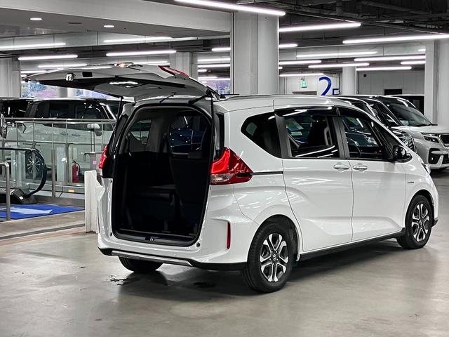 フリードハイブリッド ハイブリッド・クロスターホンダセンシング 衝突軽減ブレーキ 車線逸脱警報 アダプティブクルーズ ETC 純正9インチナビ 両側パワースライド バックカメラ BTオーディオ フルセグTV USB スマートキー オートリトラミラー LEDランプ(26枚目)