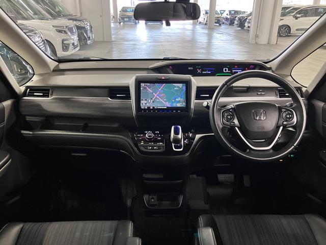 フリードハイブリッド ハイブリッド・EX ホンダセンシング 純正9インチナビ 両側電動スライド シートヒーター コンビシート バックカメラ BTオーディオ フルセグTV CD・DVD ETC コンフォートビューPKG LEDライト 純正15AW スペアキー有(4枚目)