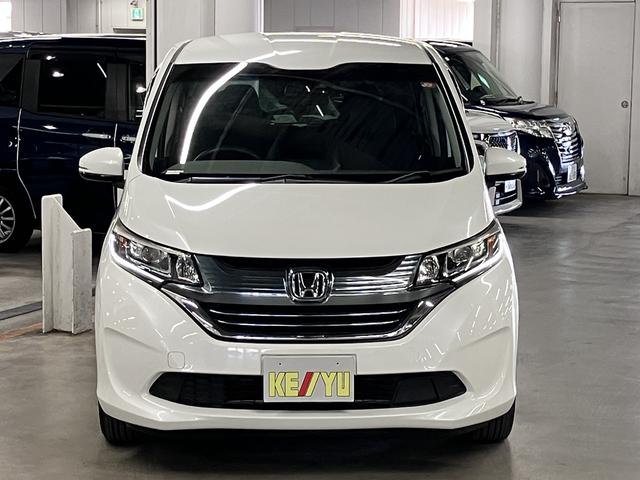 フリードハイブリッド ハイブリッド・EX ホンダセンシング 純正9インチナビ 両側電動スライド シートヒーター コンビシート バックカメラ BTオーディオ フルセグTV CD・DVD ETC コンフォートビューPKG LEDライト 純正15AW スペアキー有(6枚目)