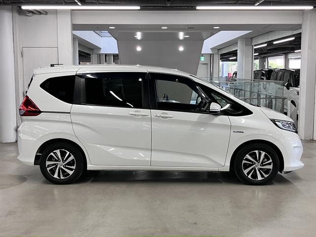 フリードハイブリッド ハイブリッド・EX ホンダセンシング 純正9インチナビ 両側電動スライド シートヒーター コンビシート バックカメラ BTオーディオ フルセグTV CD・DVD ETC コンフォートビューPKG LEDライト 純正15AW スペアキー有(9枚目)