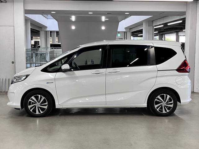 フリードハイブリッド ハイブリッド・EX ホンダセンシング 純正9インチナビ 両側電動スライド シートヒーター コンビシート バックカメラ BTオーディオ フルセグTV CD・DVD ETC コンフォートビューPKG LEDライト 純正15AW スペアキー有(10枚目)