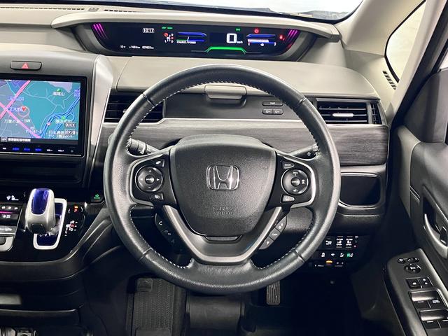 フリードハイブリッド ハイブリッド・EX ホンダセンシング 純正9インチナビ 両側電動スライド シートヒーター コンビシート バックカメラ BTオーディオ フルセグTV CD・DVD ETC コンフォートビューPKG LEDライト 純正15AW スペアキー有(11枚目)