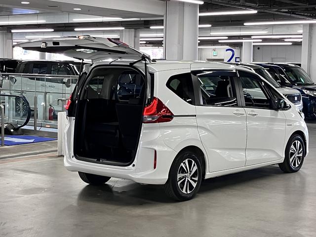 フリードハイブリッド ハイブリッド・EX ホンダセンシング 純正9インチナビ 両側電動スライド シートヒーター コンビシート バックカメラ BTオーディオ フルセグTV CD・DVD ETC コンフォートビューPKG LEDライト 純正15AW スペアキー有(26枚目)