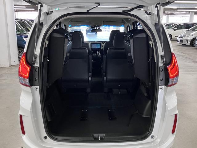 フリードハイブリッド ハイブリッド・EX ホンダセンシング 純正9インチナビ 両側電動スライド シートヒーター コンビシート バックカメラ BTオーディオ フルセグTV CD・DVD ETC コンフォートビューPKG LEDライト 純正15AW スペアキー有(28枚目)