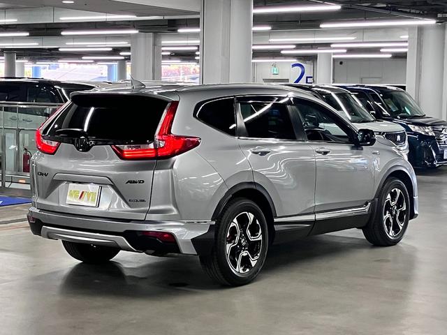 CR-Vハイブリッド EX 4WD 寒冷地仕様 モデューロエアロ アドバンスドルームミラー ホンダセンシング BSI ETC2.0 シートヒーター 純正ナビ フロント・バックカメラ メモリーシート ワイヤレス充電 オートリトラミラー パーキングセンサー LEDランプ(3枚目)